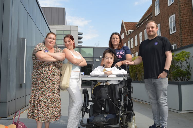 Campaigners from the Disability Union outside the Hampshire County Council office in Winchester