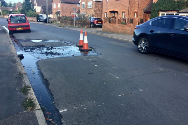 Water leak in Chawton Park Road, Alton, August 22nd 2022.