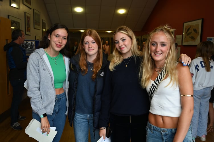 Alton School pupils Anna, Lara, Natalie and Jemima celebrate their GCSE results, August 25th 2022.