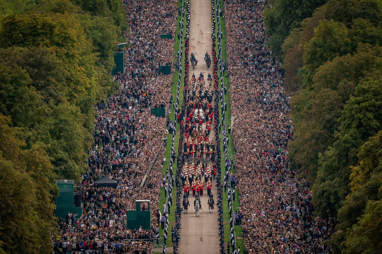 The Ceremonial Procession of the coffin of Queen Elizabeth II travels down the Long Walk as it arrives at Windsor Castle for the Committal Service at St George's Chapel. Picture date: Monday September 19, 2022.