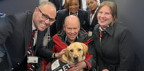 One man and his dog visit Northern Ireland school