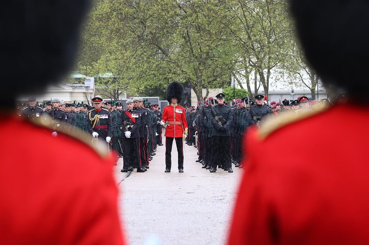 Image of military personnel, seen here at Wellington Barracks in London, before taking part in the King's Coronation.

The UK Armed Forces conduct their largest ceremonial operation for 70 years today (06/05/2023), and accompanied Their Majesties King Charles III and Queen Consort Camilla to the Coronation service at Westminster Abbey.

More than 7,000 soldiers, sailors and aviators from across the UK and Commonwealth participated in ceremonial activities across processions, fly pasts and gun salutes marking the historic event.

With around 200 personnel providing a Guard of Honour at Buckingham Palace, together this made up the largest UK military ceremonial operation for 70 years.

As well as marching detachments from across the Household Division, Royal Navy, British Army and Royal Air Force, more than 400 troops from the Commonwealth nations and British Overseas Territories were on parade, representing the diversity and traditions of Armed Forces around the globe with connections to His Majesty The King.

Foot Guards of the Household Division lined The Mall, the Royal Navy lined their spiritual home at Admiralty Arch, the Royal Marines at Trafalgar Square and the Royal Air Force Whitehall and Parliament Square.


