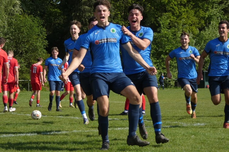 Dan Clark celebrates after scoring against Colden Common