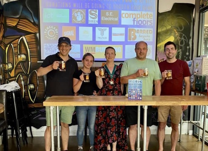 Bordon Beer and Cider Festival, Tap at The Shed, Bordon, June 16th 2023. From left: Tap owner Ed Spice, Tap assistant manager Bonnie Wright, Cllr Catherine Clark, Simon Sharpe of S E Electrical and Cllr Andy Tree.