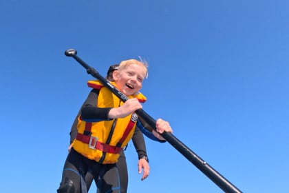 Six-year-old charity ace Dexter smashes 15-mile paddleboard challenge