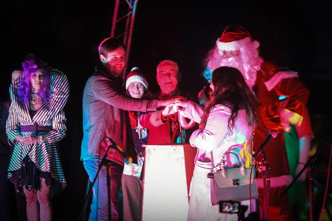 The magic moment as Jay Hayes places the ring on his new fiancée Louisa’s finger at the Farnham Christmas Lights Switch-on