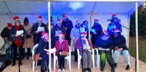 Festive joy for Bordon group on choir's debut at Grayshott light event