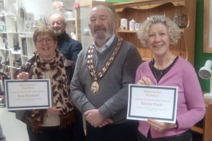 Resurrection Furniture gives certificates to long-serving volunteers