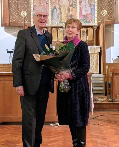 HHH Concerts chairman Stephen Dennison presents its new honorary patron Dame Ann Murray with a bouquet at St Christopher's Church in Wey Hill, Haslemere, on January 24th 2024. 