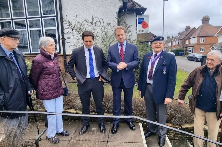 Johnny Mercer and Greg Stafford with trustees of the Spirit of Normandy Trust (left) and Royal British Legion (right) outside the Hindhead Royal British Legion in Beacon Hill