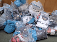 Police seize £50,000 worth of fake football shirts in Haslemere raid