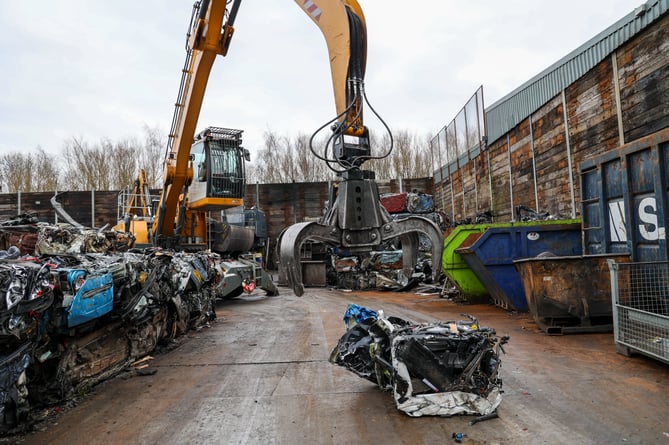 Crushing illegal e-bikes and scooters by Hampshire Police.