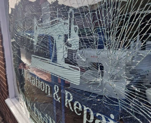 Explosion shatters shop window on eve of anniversary